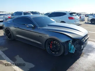 2021 Ford Mustang GT z VIN 1FA6P8CF0M5148961, wystawiony jako IAAI lot #42211976 z przebiegiem 14 181 mil mil oraz . Historia ofert i sprzedaży dostępna na DreamBid. Obrazek 1.