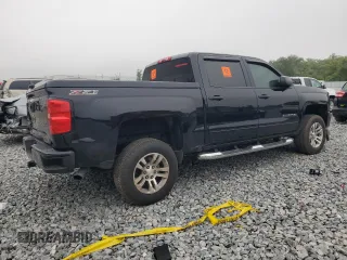 2016 Chevrolet Silverado 1500 LT with VIN 3GCUKREC1GG388719, listed as a Copart auction lot 49661455 with 138,886 mi miles and Salvage Title. Bid and sale history available at DreamBid. Image 3.