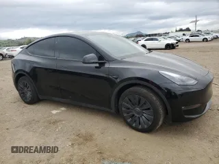 2023 Tesla Model Y Long Range with VIN 7SAYGDEE1PF923998, listed as a Copart auction lot 48954205 with 21,525 mi miles and Salvage Title. Bid and sale history available at DreamBid. Image 4.