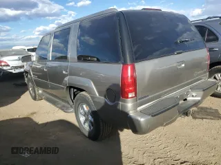 2000 Cadillac Escalade z VIN 1GYEK63R3YR218500, wystawiony jako Copart lot #77676354 z przebiegiem 164 602 mil mil oraz Tytuł czysty. Historia ofert i sprzedaży dostępna na DreamBid. Obrazek 2.