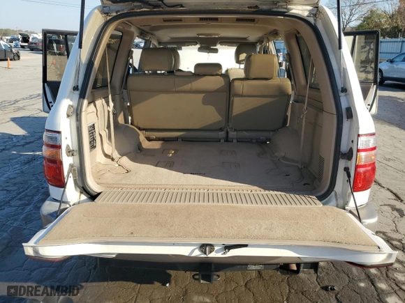 1999 Toyota Land Cruiser with VIN JT3HT05J8X0049750, listed as a Copart auction lot 77547144 with 168,435 mi miles and Salvage Title. Bid and sale history available at carsss.com. Image 13.