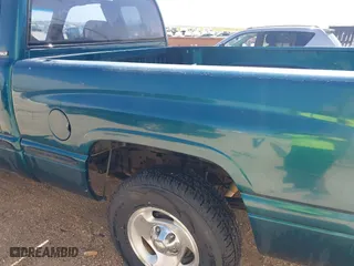 1999 Dodge Ram 1500 with VIN 3B7HC13Y0XG169104, listed as a IAAI auction lot 41936221 with 183,546 mi miles. Bid and sale history available at carsss.com. Image 13.