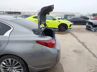 2019 Infiniti Q50 3.0t LUXE with VIN JN1EV7AP6KM511156, listed as a IAAI auction lot 41576308 with 63,620 mi miles. Bid and sale history available at carsss.com. Image 18.