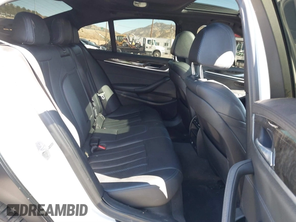 2020 BMW 5 Series 530e with VIN WBAJA9C02LCD31800, listed as a IAAI auction lot 41669765 with 99,024 mi miles and . Bid and sale history available at DreamBid. Image 8.