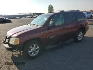 2002 GMC Envoy SLE with VIN 1GKDS13S422359524, listed as a Copart auction lot 70102264 with 183,814 mi miles and Salvage Title. Bid and sale history available at carsss.com. Image 1.