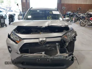 2021 Toyota RAV4 XLE with VIN 2T3P1RFV5MC180890, listed as a IAAI auction lot 42567858 with 56,961 mi miles and . Bid and sale history available at DreamBid. Image 6.