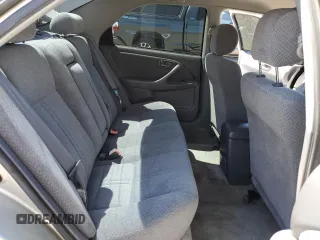 2000 Toyota Camry CE with VIN JT2BG22KXY0492183, listed as a Copart auction lot 52596705 with 181,840 mi miles and Salvage Title. Bid and sale history available at carsss.com. Image 10.