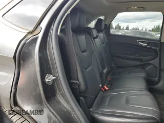2015 Ford Edge Titanium z VIN 2FMTK4K84FBB09582, wystawiony jako Copart lot #55801915 z przebiegiem 72 533 mil mil oraz Szkoda całkowita • Salvage title. Historia ofert i sprzedaży dostępna na DreamBid. Obrazek 11.
