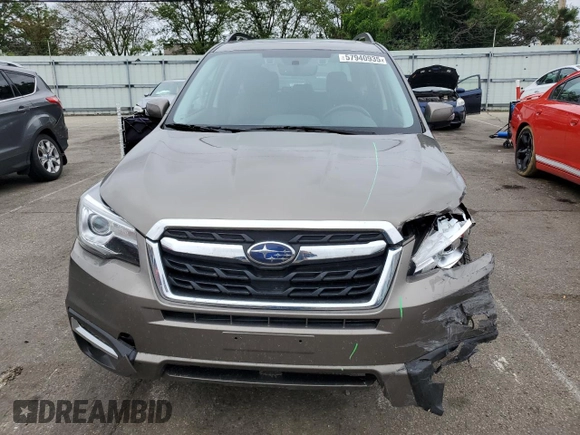 2018 Subaru Forester Touring with VIN JF2SJAWC9JH570189, listed as a Copart auction lot 57940935 with 76,574 mi miles and Salvage title. Bid and sale history available at DreamBid. Image 5.