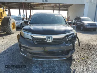 2019 Honda Pilot Touring 8-Passenger z VIN 5FNYF5H97KB007291, wystawiony jako Copart lot #47608765 z przebiegiem 70 758 mil mil oraz Szkoda całkowita • Salvage title. Historia ofert i sprzedaży dostępna na DreamBid. Obrazek 5.