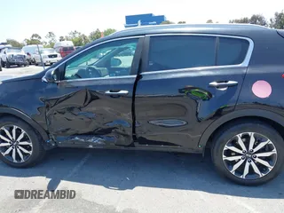 2017 Kia Sportage EX z VIN KNDPN3AC1H7242955, wystawiony jako IAAI lot #42473072 z przebiegiem 112 038 mil mil oraz . Historia ofert i sprzedaży dostępna na DreamBid. Obrazek 14.