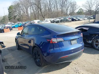 2022 Tesla Model Y Performance with VIN 7SAYGDEF7NF497076, listed as a IAAI auction lot 41759793 with 46,970 mi miles and . Bid and sale history available at DreamBid. Image 3.