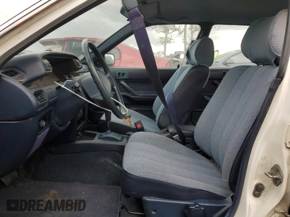 1991 Toyota Camry z VIN 4T1SV24E5MU355011, wystawiony jako Copart lot #51021185 z przebiegiem 135 881 mil mil oraz Czysty tytuł • Clean title. Historia ofert i sprzedaży dostępna na DreamBid. Obrazek 7.