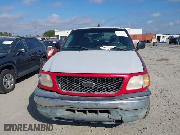 2000 Ford F-150 XL with VIN 1FTZX1729YNC32076, listed as a IAAI auction lot 41523364 with 216,726 mi miles. Bid and sale history available at carsss.com. Image 12.