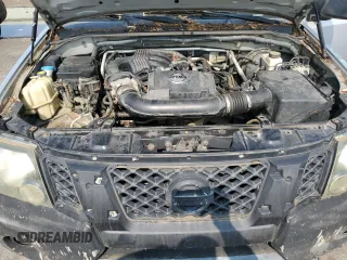 2010 Nissan Xterra SE z VIN 5N1AN0NW5AC509239, wystawiony jako Copart lot #59434865 z przebiegiem 106 209 mil mil oraz Czysty tytuł • Clean title. Historia ofert i sprzedaży dostępna na DreamBid. Obrazek 13.