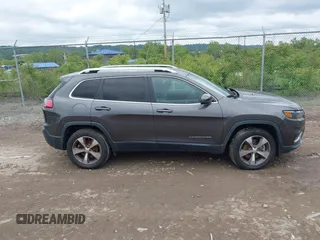2020 Jeep Cherokee Limited z VIN 1C4PJMDN2LD604705, wystawiony jako IAAI lot #42372155 z przebiegiem 85 937 mil mil oraz . Historia ofert i sprzedaży dostępna na DreamBid. Obrazek 13.