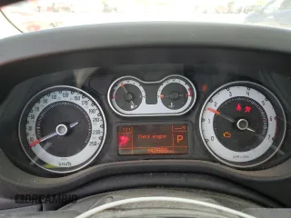 2014 FIAT 500L Lounge z VIN ZFBCFACHXEZ026808, wystawiony jako Copart lot #56567785 z przebiegiem 142 565 mil mil oraz Tytuł czysty. Historia ofert i sprzedaży dostępna na DreamBid. Obrazek 9.