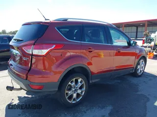 2015 Ford Escape Titanium with VIN 1FMCU9J92FUA53699, listed as a IAAI auction lot 40500310 with 197,581 mi miles. Bid and sale history available at carsss.com. Image 4.