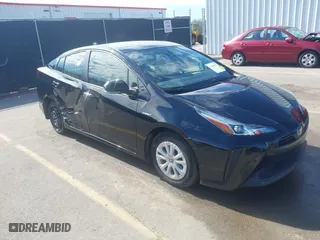 2020 Toyota Prius L Eco with VIN JTDKARFU3L3106899, listed as a IAAI auction lot 41640377 with 121,601 mi miles. Bid and sale history available at carsss.com. Image 1.