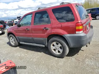 2005 Ford Escape XLT with VIN 1FMYU93195KA54937, listed as a Copart auction lot 52060135 with 95,649 mi miles and Clean Title. Bid and sale history available at carsss.com. Image 2.