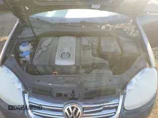 2009 Volkswagen Jetta z VIN 3VWTM81K89M264428, wystawiony jako Copart lot #81252684 z przebiegiem 37 664 mil mil oraz Czysty tytuł • Clean title. Historia ofert i sprzedaży dostępna na DreamBid. Obrazek 11.