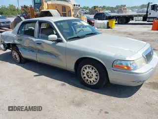 2004 Mercury Grand Marquis GS with VIN 2MEFM74W14X632470, listed as a IAAI auction lot 42120233 with 292,357 mi miles and . Bid and sale history available at DreamBid. Image 1.