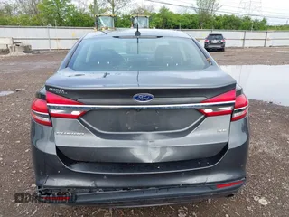 2017 Ford Fusion SE with VIN 3FA6P0H76HR411928, listed as a IAAI auction lot 42124817 with 88,184 mi miles and . Bid and sale history available at DreamBid. Image 16.