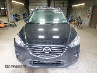 2016 Mazda CX-5 Grand Touring with VIN JM3KE4DY3G0859067, listed as a Copart auction lot 49759775 with 92,928 mi miles and Salvage Title. Bid and sale history available at carsss.com. Image 5.