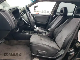 2002 Infiniti G20 Luxury z VIN JNKCP11A52T509703, wystawiony jako Copart lot #56278004 z przebiegiem 222 049 mil mil oraz Szkody całkowita. Historia ofert i sprzedaży dostępna na DreamBid. Obrazek 7.