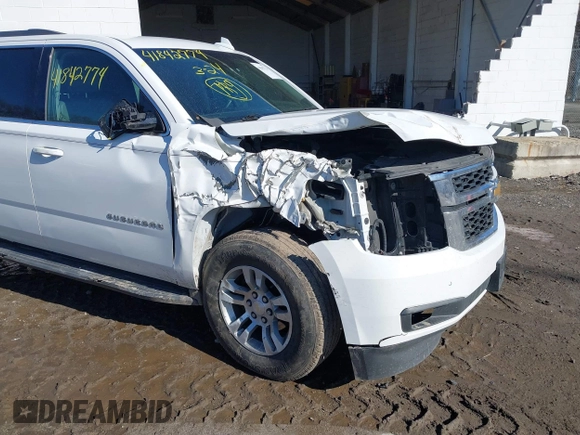 2016 Chevrolet Suburban LT with VIN 1GNSKHKCXGR206948, listed as a IAAI auction lot 41842774 with 190,935 mi miles. Bid and sale history available at carsss.com. Image 6.
