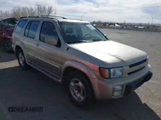 1999 Infiniti QX4 with VIN JNRAR05Y1XW049028, listed as a IAAI auction lot 41725075 with 296,653 mi miles and . Bid and sale history available at DreamBid. Image 1.