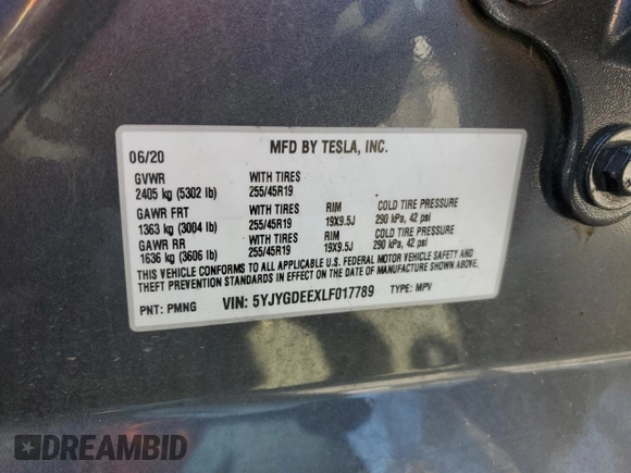 2020 Tesla Model Y Long Range with VIN 5YJYGDEEXLF017789, listed as a Copart auction lot 52705185 with 49,470 mi miles and Salvage Title. Bid and sale history available at DreamBid. Image 12.