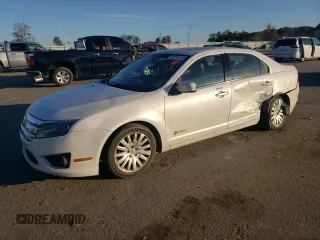 2012 Ford Fusion Hybrid с VIN 3FADP0L36CR353159, выставлен на аукционе Copart как лот 47776025 с пробегом 269 231 миль миль и Списание • Salvage title. История ставок и продаж доступна на DreamBid. Изображение 1.