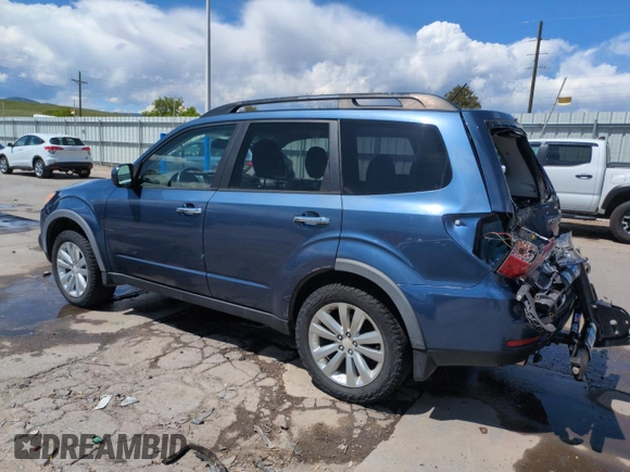 2011 Subaru Forester X Limited with VIN JF2SHAEC7BH739950, listed as a Copart auction lot 54569515 with 115,238 mi miles and Salvage title. Bid and sale history available at DreamBid. Image 2.