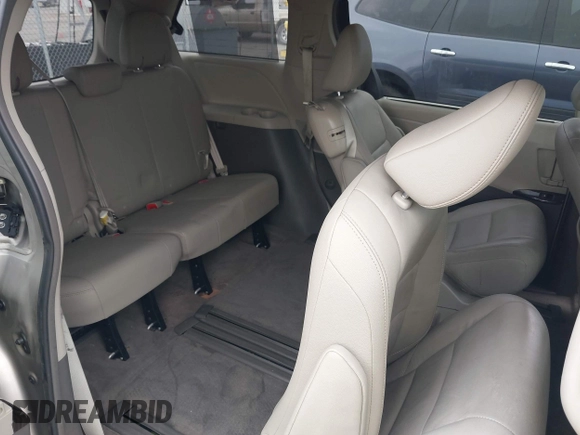2015 Toyota Sienna XLE with VIN 5TDYK3DCXFS578888, listed as a IAAI auction lot 42187384 with 105,287 mi miles and . Bid and sale history available at DreamBid. Image 8.