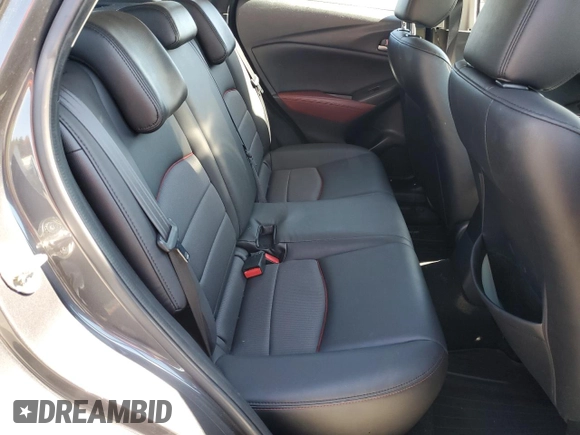 2017 Mazda CX-3 Touring z VIN JM1DKFC72H0167351, wystawiony jako Copart lot #56230945 z przebiegiem 78 894 mil mil oraz Szkody całkowita. Historia ofert i sprzedaży dostępna na DreamBid. Obrazek 10.