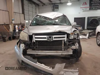 2006 Honda Pilot EX with VIN 2HKYF18416H534697, listed as a IAAI auction lot 41715642 with 224,093 mi miles and . Bid and sale history available at DreamBid. Image 11.