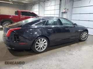 2016 Jaguar XJ R-Sport with VIN SAJWJ1CDXG8V99210, listed as a Copart auction lot 82693224 with 81,978 mi miles and Salvage title. Bid and sale history available at DreamBid. Image 3.