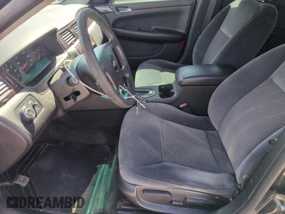 2012 Chevrolet Impala LS Fleet with VIN 2G1WF5E3XC1308755, listed as a Copart auction lot 56601395 with 238,851 mi miles and Clean Title. Bid and sale history available at DreamBid. Image 7.