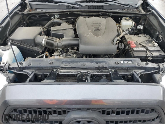 2017 Toyota Tacoma SR5 z VIN 3TMDZ5BN1HM030372, wystawiony jako Copart lot #54547985 z przebiegiem 67 663 mil mil oraz Szkoda całkowita • Salvage title. Historia ofert i sprzedaży dostępna na DreamBid. Obrazek 11.