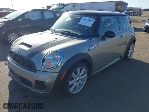 2007 MINI Hardtop S with VIN WMWMF73567TL91385, listed as a IAAI auction lot 41866865 with 114,778 mi miles and . Bid and sale history available at DreamBid. Image 17.
