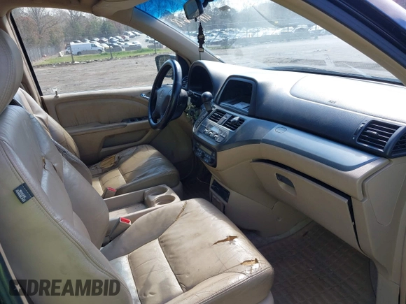 2005 Honda Odyssey EX-L with VIN 5FNRL38785B113074, listed as a IAAI auction lot 41907648 with 305,956 mi miles and . Bid and sale history available at DreamBid. Image 5.