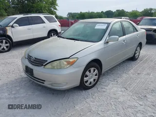 2004 Toyota Camry LE with VIN 4T1BE32K04U286257, listed as a IAAI auction lot 42079619 with 205,634 mi miles. Bid and sale history available at carsss.com. Image 2.