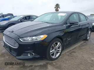 2016 Ford Fusion SE Hybrid with VIN 3FA6P0LU5GR356433, listed as a IAAI auction lot 41799204 with 157,670 mi miles. Bid and sale history available at carsss.com. Image 17.