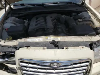 2009 Chrysler 300 Touring z VIN 2C3KA53V09H594340, wystawiony jako Copart lot #57789525 z przebiegiem 166 216 mil mil oraz Szkoda całkowita • Salvage title. Historia ofert i sprzedaży dostępna na DreamBid. Obrazek 11.