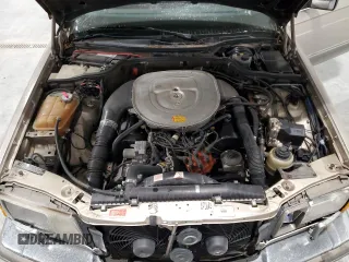 1990 Mercedes-Benz 560 with VIN WDBCA39E7LA517710, listed as a Copart auction lot 85307074 with 225,233 mi miles and Salvage Title. Bid and sale history available at DreamBid. Image 11.