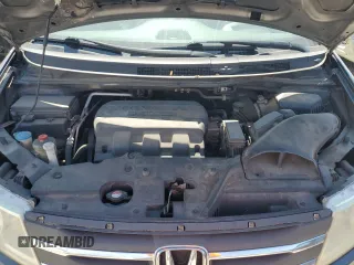 2012 Honda Odyssey Touring с VIN 5FNRL5H95CB120347, выставлен на аукционе Copart как лот 59111775 с пробегом 208 419 миль миль и Списание • Salvage title. История ставок и продаж доступна на DreamBid. Изображение 11.