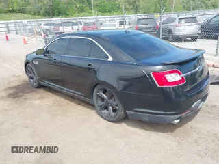 2012 Ford Taurus SHO z VIN 1FAHP2KT6CG143490, wystawiony jako IAAI lot #42235776 z przebiegiem 125 671 mil mil oraz . Historia ofert i sprzedaży dostępna na DreamBid. Obrazek 3.
