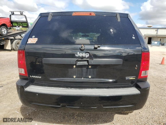 2007 Jeep Grand Cherokee Laredo with VIN 1J8HS48P37C594980, listed as a Copart auction lot 74819394 with 105,904 mi miles and Salvage Title. Bid and sale history available at carsss.com. Image 6.