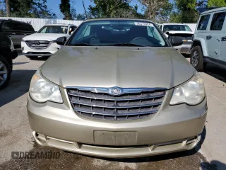 2010 Chrysler Sebring Touring z VIN 1C3BC5ED8AN166543, wystawiony jako Copart lot #56316984 z przebiegiem 78 655 mil mil oraz Szkody całkowita. Historia ofert i sprzedaży dostępna na DreamBid. Obrazek 5.